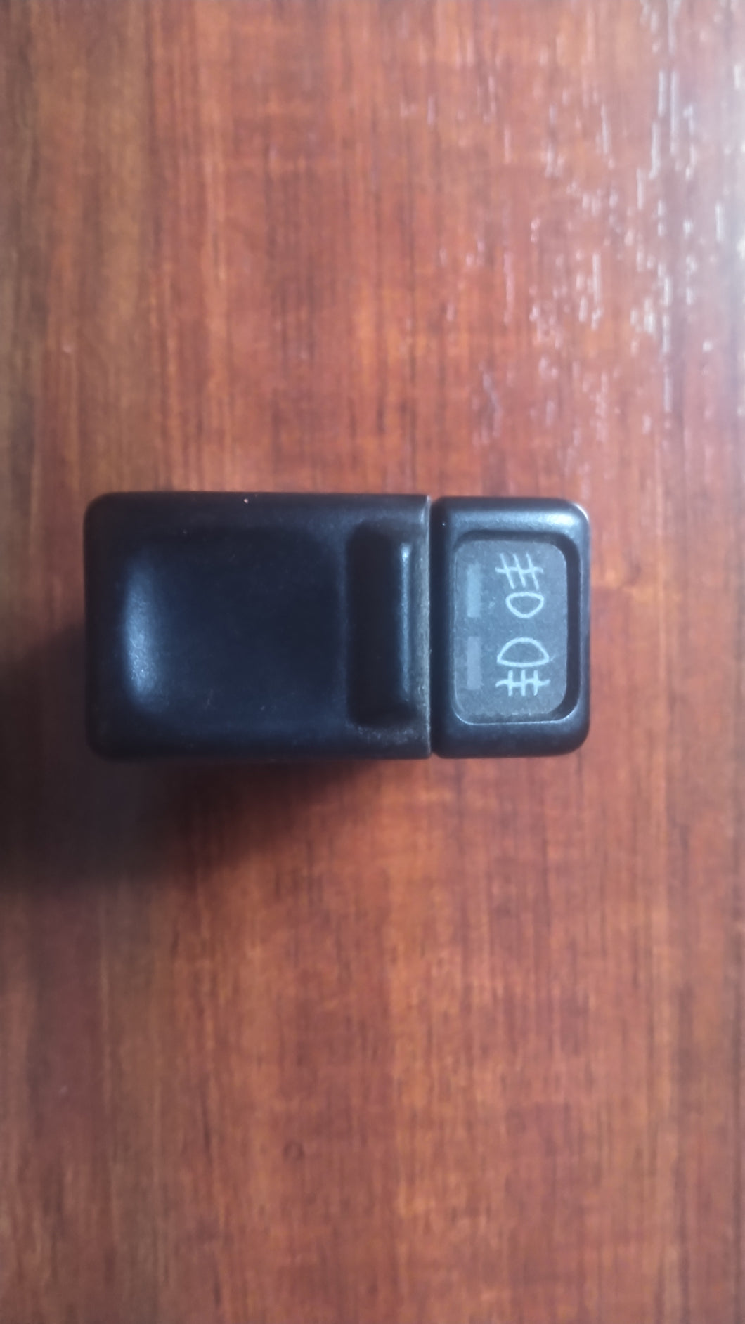 Fog light switch, dual, front and rear. Black, pulled from a Volvo 960